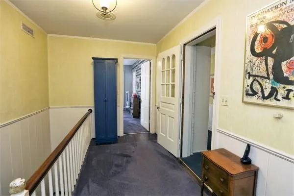 a view of a hallway with entryway