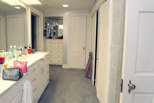 a spacious bathroom with a sink vanity and mirror