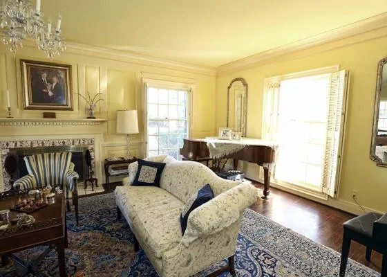 a living room with furniture and a window