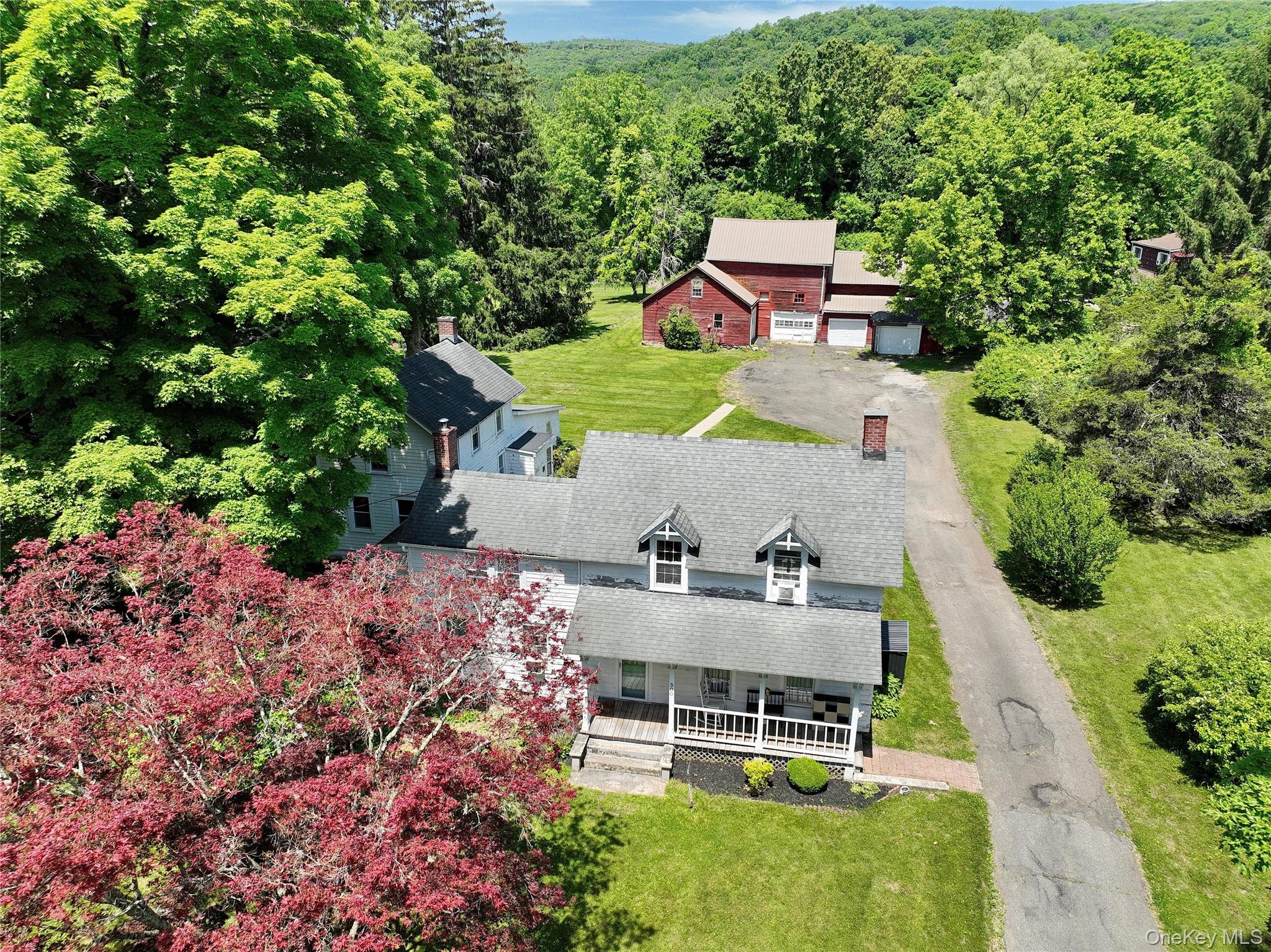 500 Haverstraw Road Suffern, NY 10901 - Photo 32 of 36 an aerial view of a house with a yard and pool
