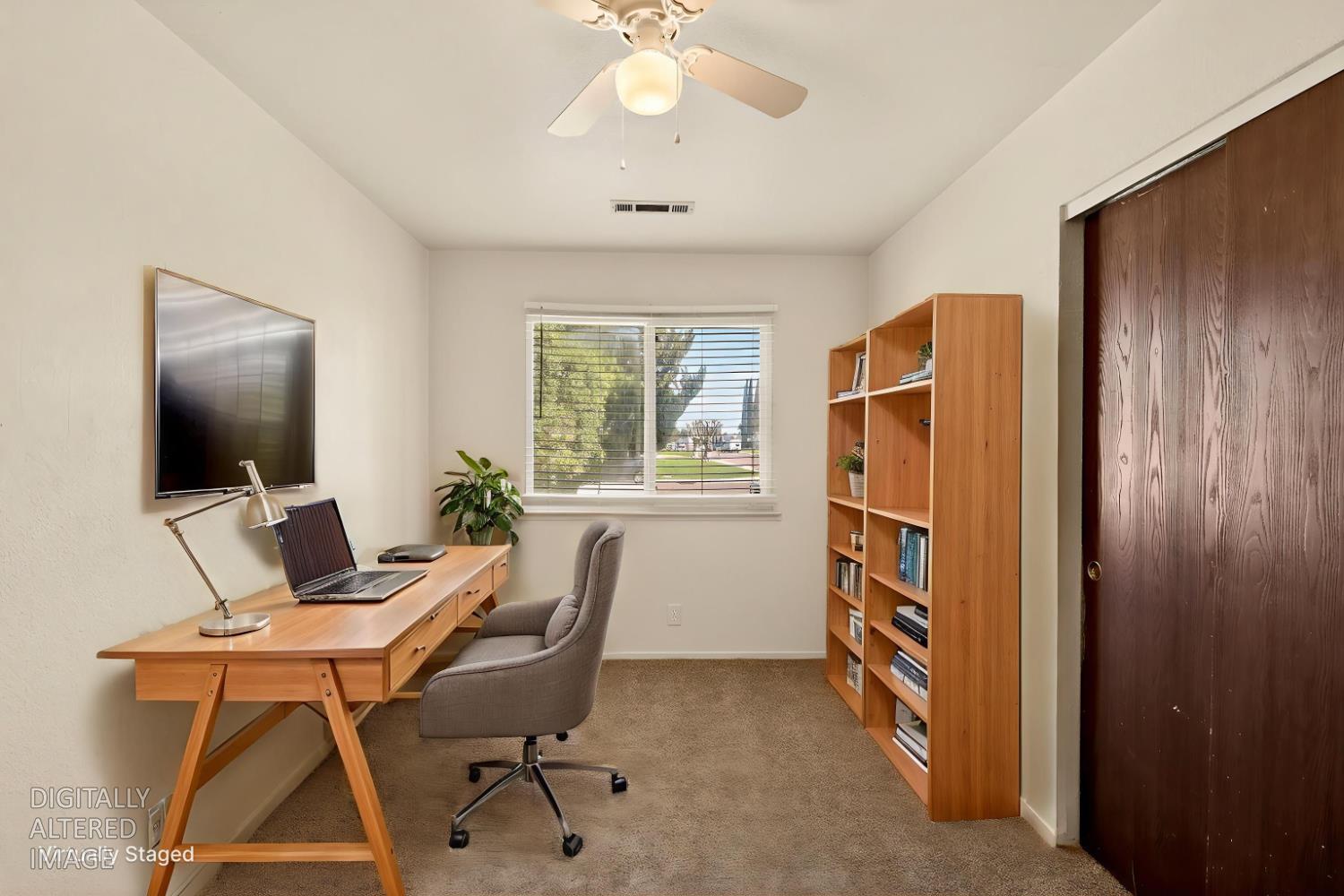 2915 Balsam Way Merced, CA 95348 - Photo 21 of 40 a workspace with furniture and a window