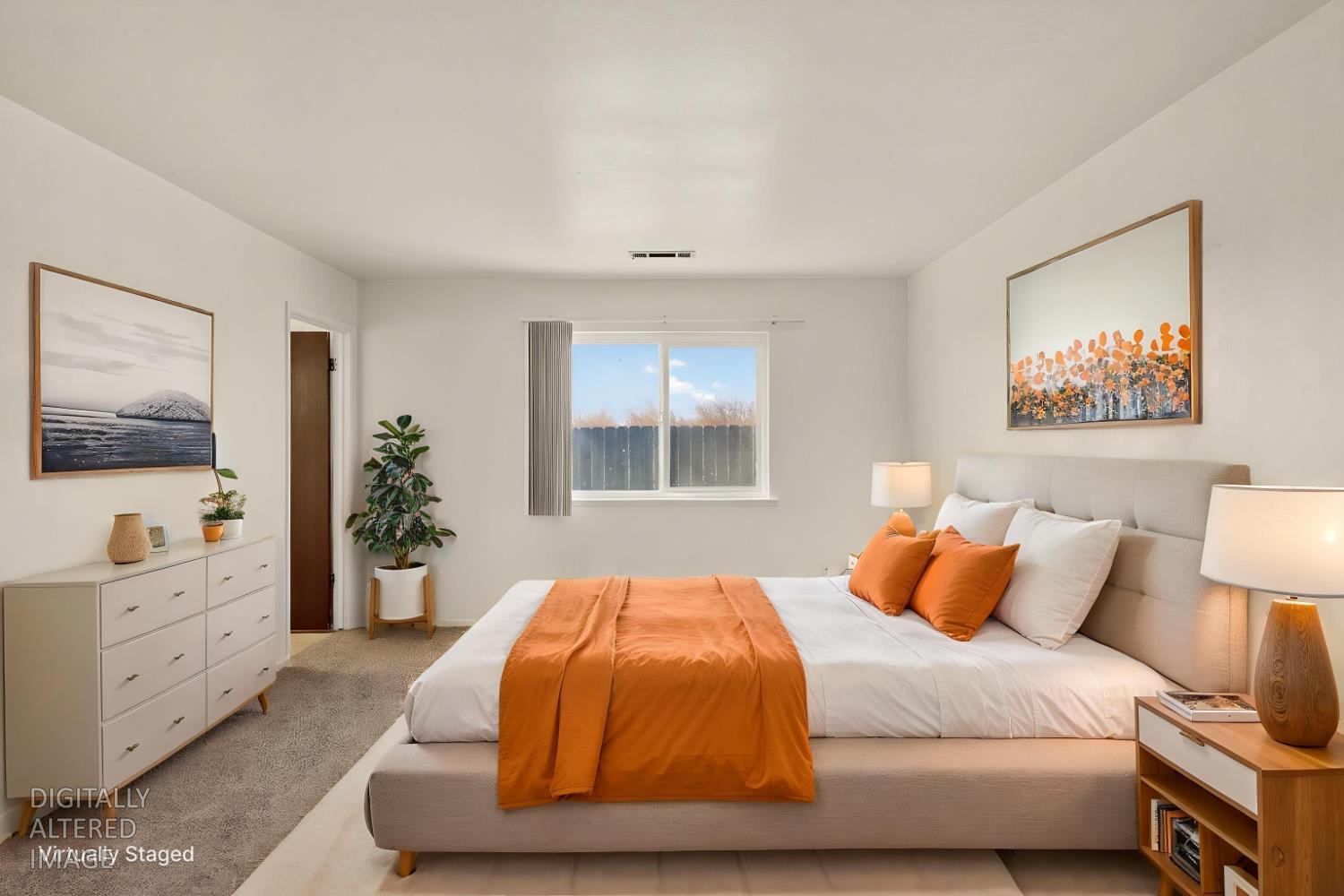 2915 Balsam Way Merced, CA 95348 - Photo 25 of 40 a bedroom with a large bed and a window