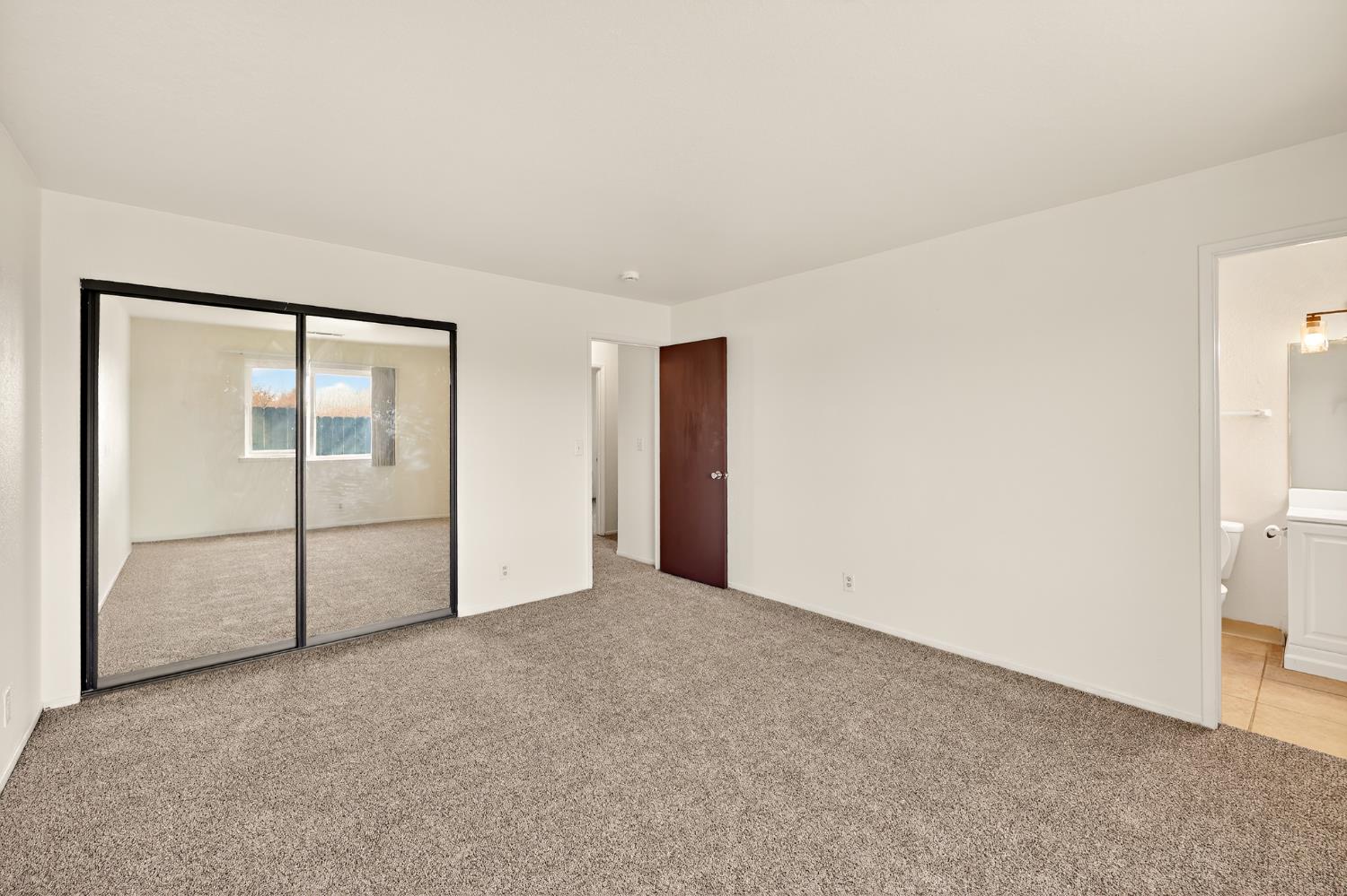2915 Balsam Way Merced, CA 95348 - Photo 28 of 40 a view of an empty room with closet area