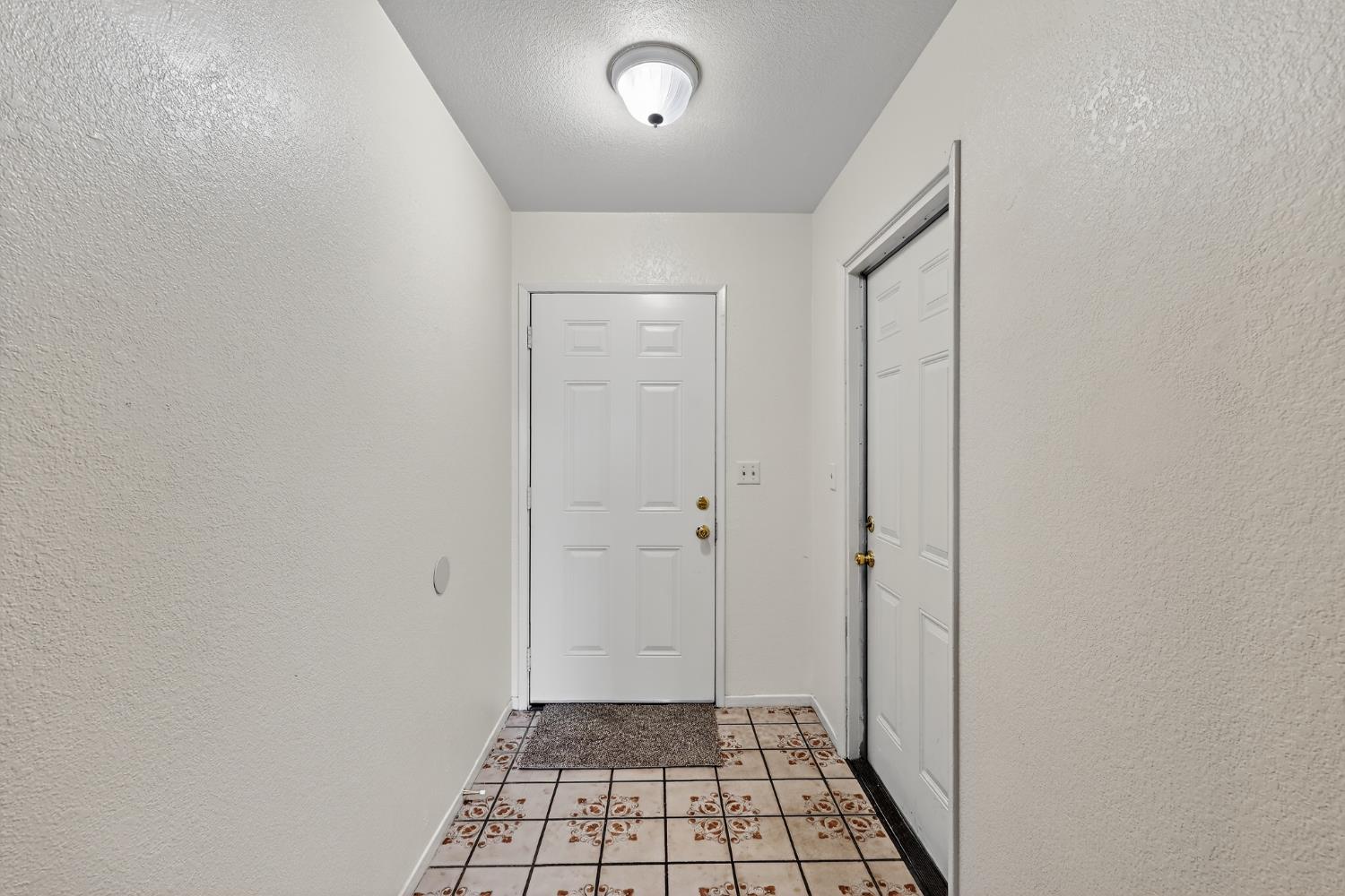 2915 Balsam Way Merced, CA 95348 - Photo 6 of 40 a view of a bathroom with a sink