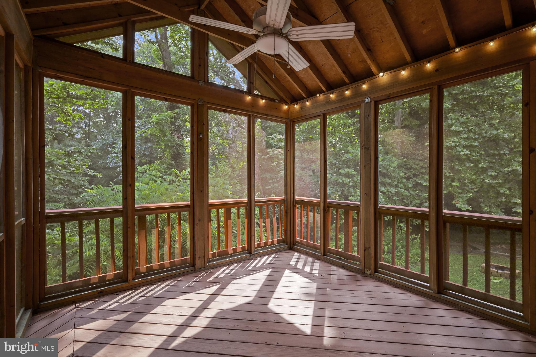 5512 Brookland Road Alexandria, VA 22310 - Photo 3 of 34 vaulted screened in porch overlooking woods