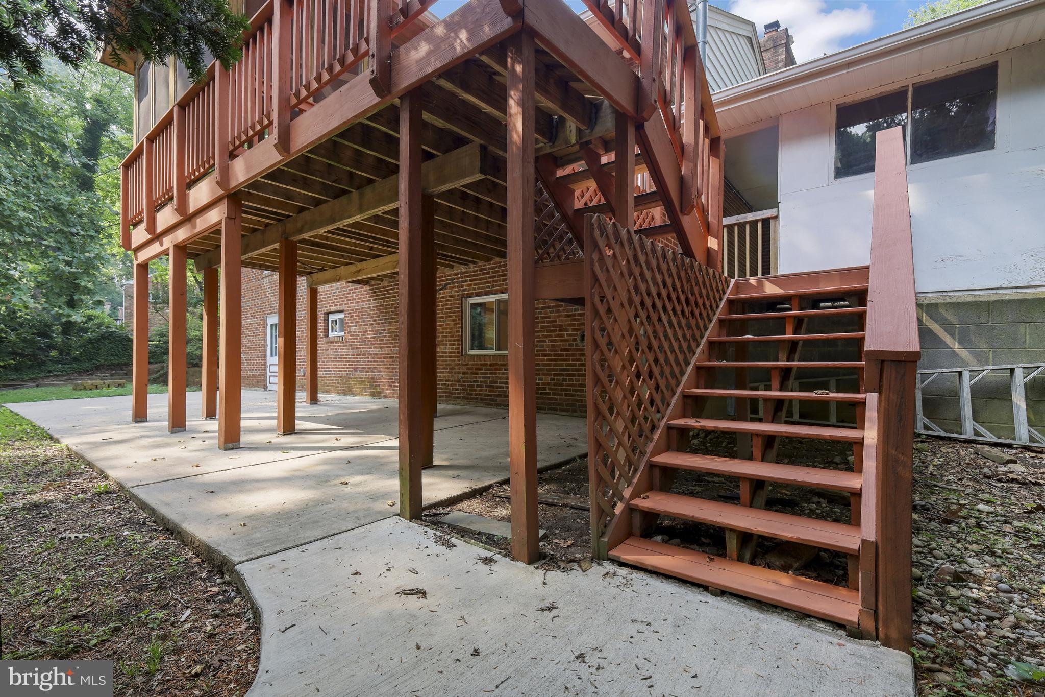 5512 Brookland Road Alexandria, VA 22310 - Photo 31 of 34 Exterior deck stairs to rear patio