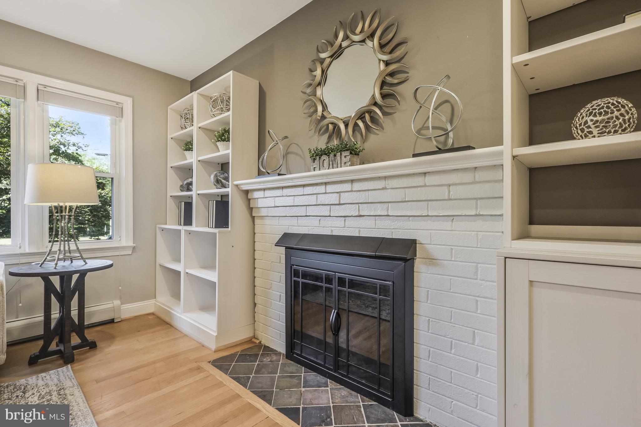 5512 Brookland Road Alexandria, VA 22310 - Photo 7 of 34 built ins around living room gas fireplace