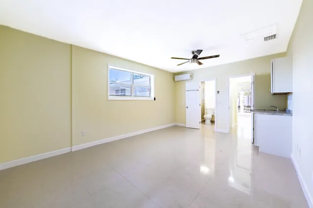 a view of a livingroom with a furniture