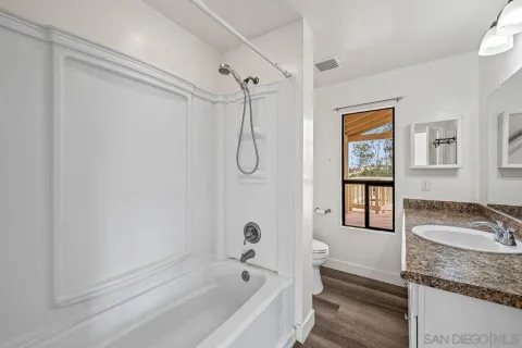 a view of small space with racks on the wall