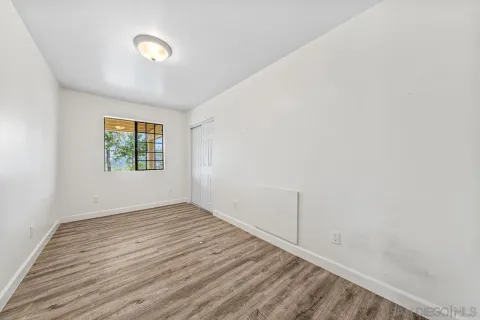 a kitchen with stainless steel appliances a refrigerator and a stove top oven