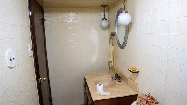 a bathroom with a sink and a toilet