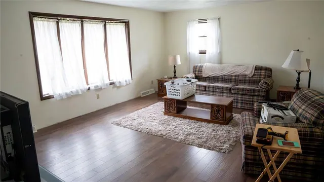 a bedroom with a bed and a closet