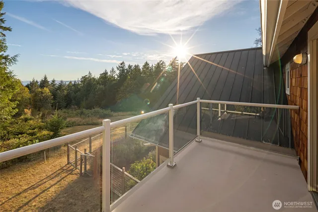 a view of balcony and yard