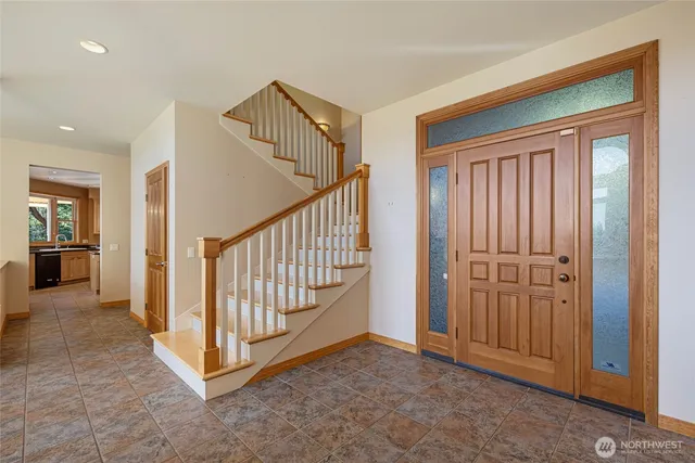 a view of a livingroom with staircase