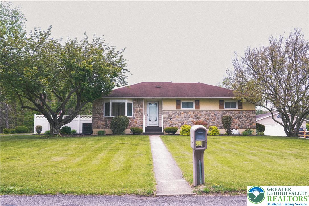 13 Craig Road Lehighton, PA 18235 - Photo 2 of 39 This charming residence features stone construction and a welcoming pathway leading to the front entrance.