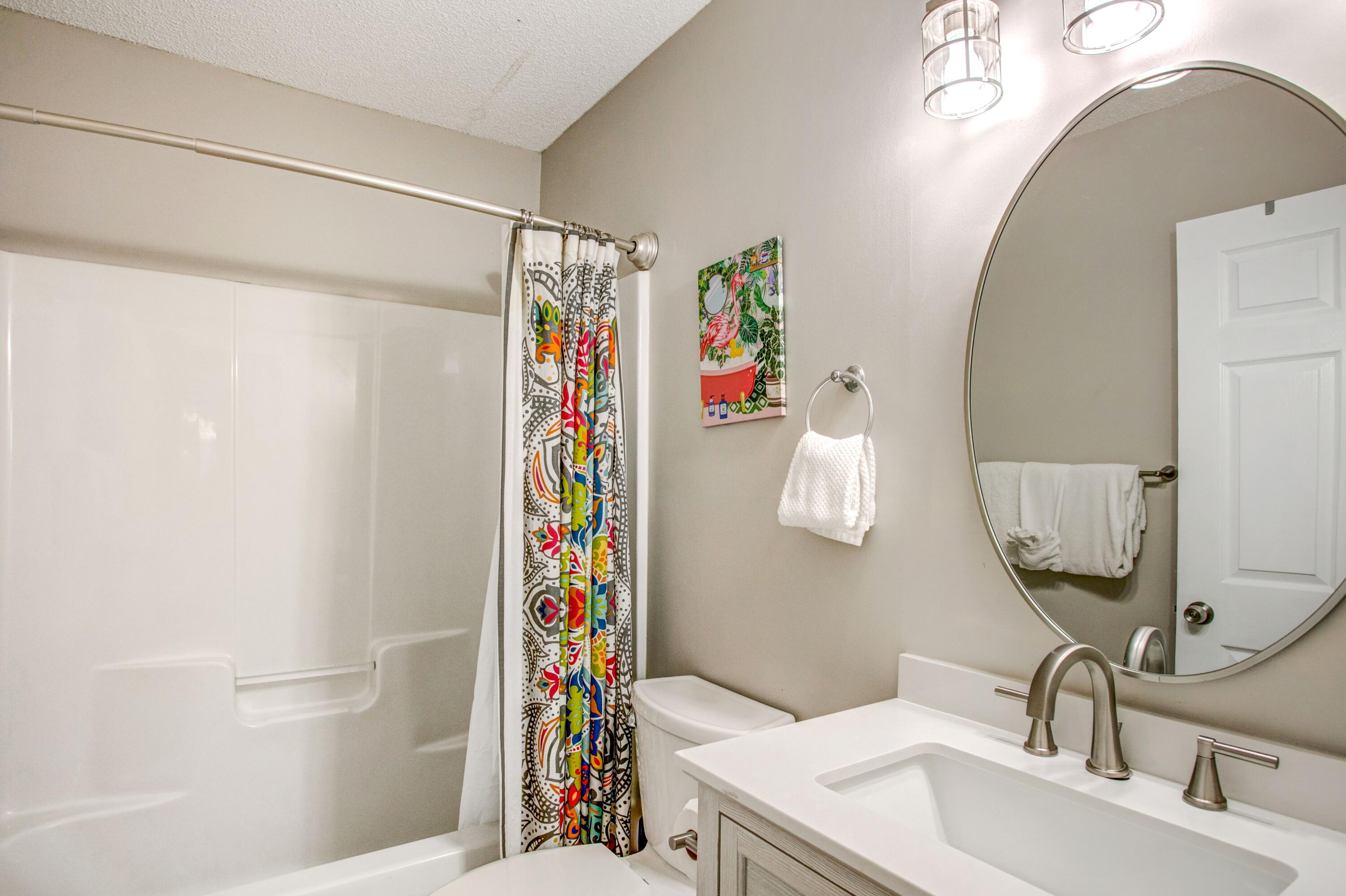 285 Payne Street, Unit 5A Miramar Beach, FL 32550 - Photo 15 of 20 a bathroom with a sink toilet and shower