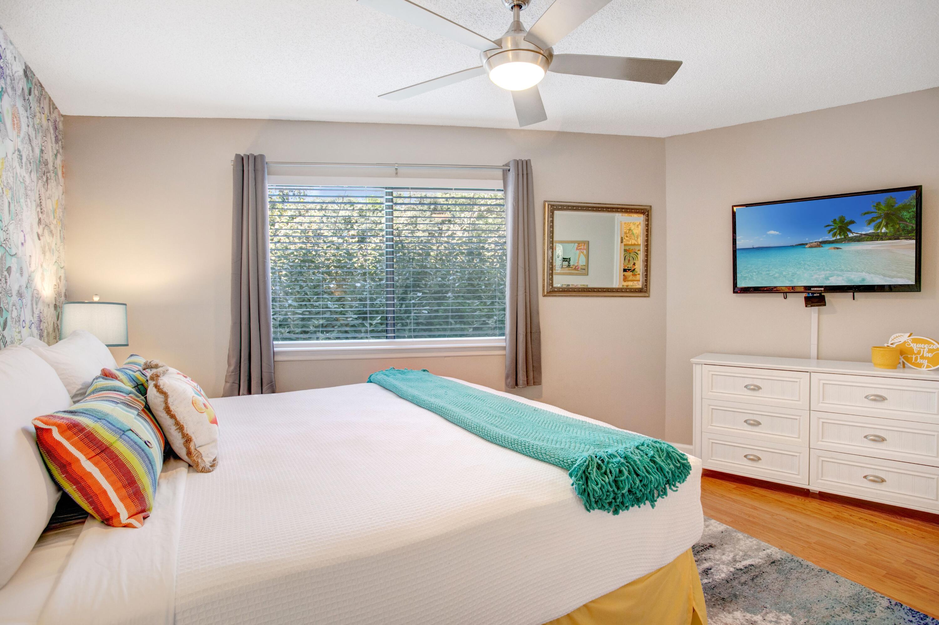 285 Payne Street, Unit 5A Miramar Beach, FL 32550 - Photo 10 of 20 a bedroom with a bed and window