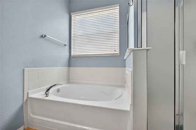 a view of a storage room with racks on the wall