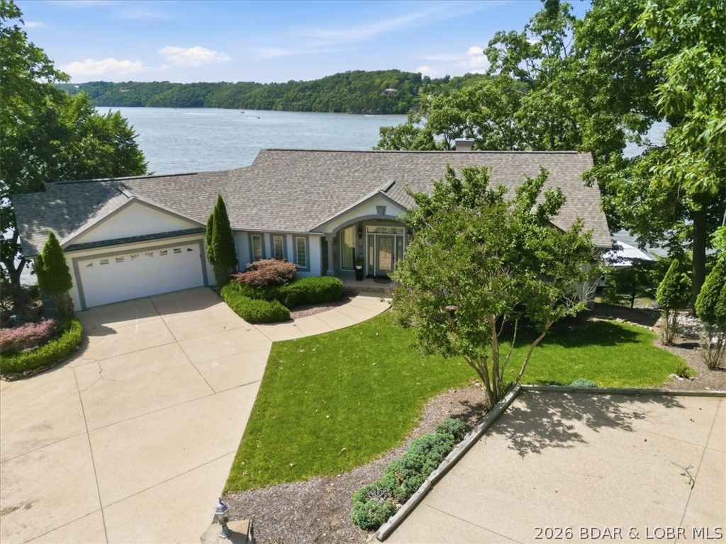 6572 Robyn Point Osage Beach, MO 65065 - Photo 3 of 49 Flat parking with extra parking pad