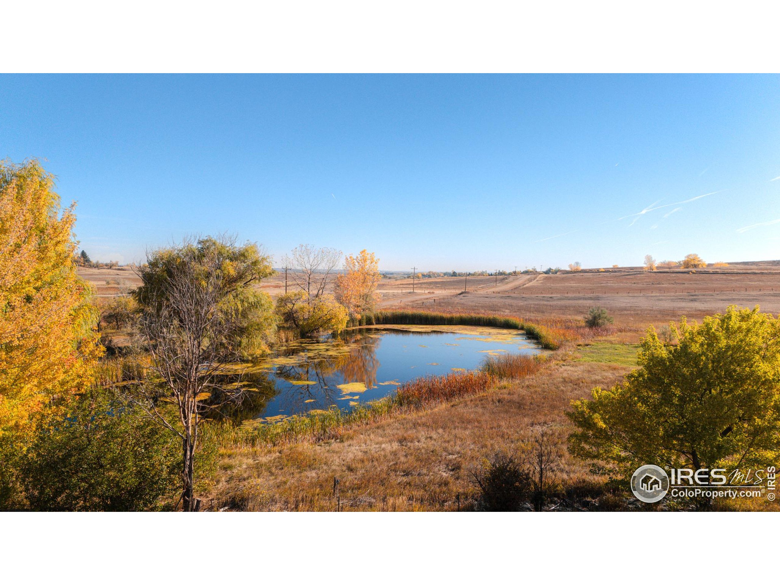 5196 Oxford Road Longmont, CO 80503 - Photo 14 of 38 a black and white photo of a lake