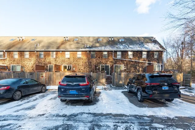 a car parked in front of a house