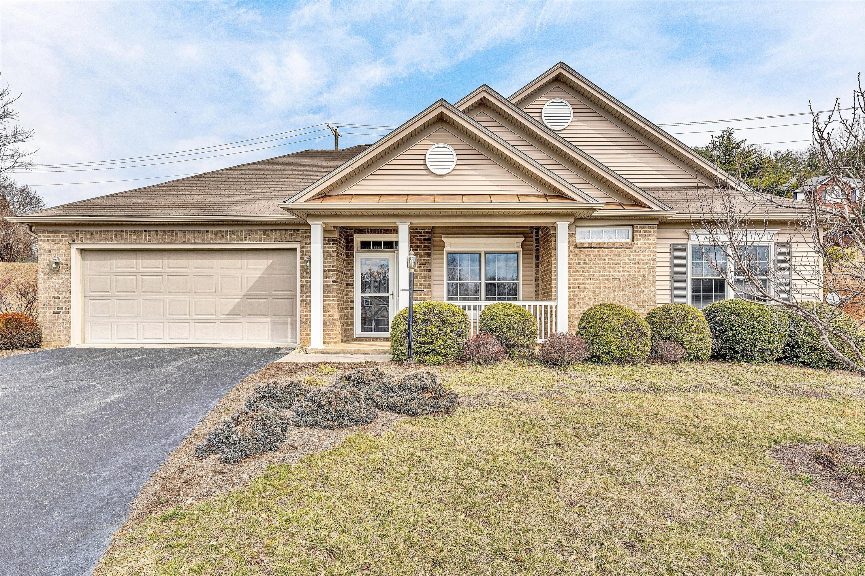 1365 Aarons Run Circle Salem, VA 24153 - Photo 2 of 35 a front view of a house with a yard