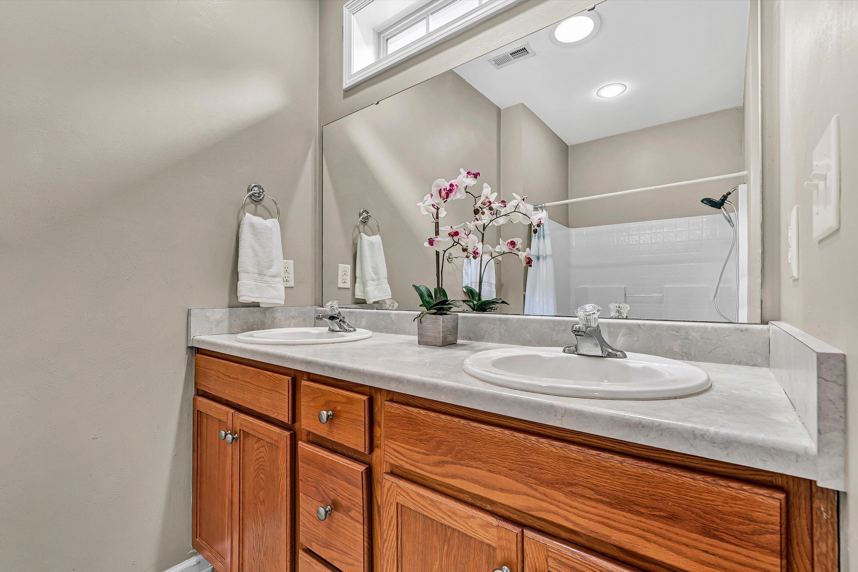 1365 Aarons Run Circle Salem, VA 24153 - Photo 21 of 35 a bathroom with double vanity sinks and a mirror