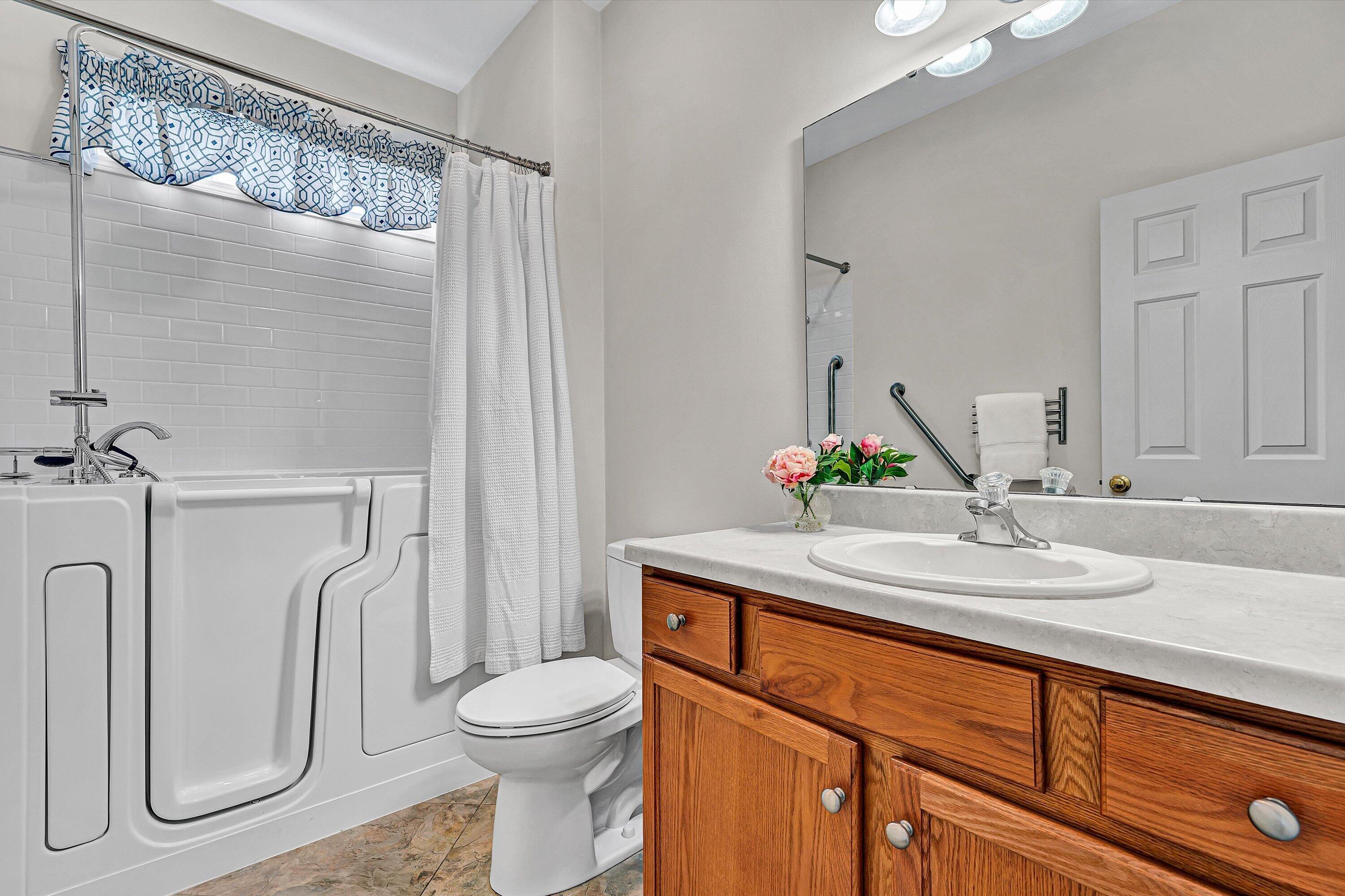 1365 Aarons Run Circle Salem, VA 24153 - Photo 22 of 35 a bathroom with a granite countertop sink toilet and shower
