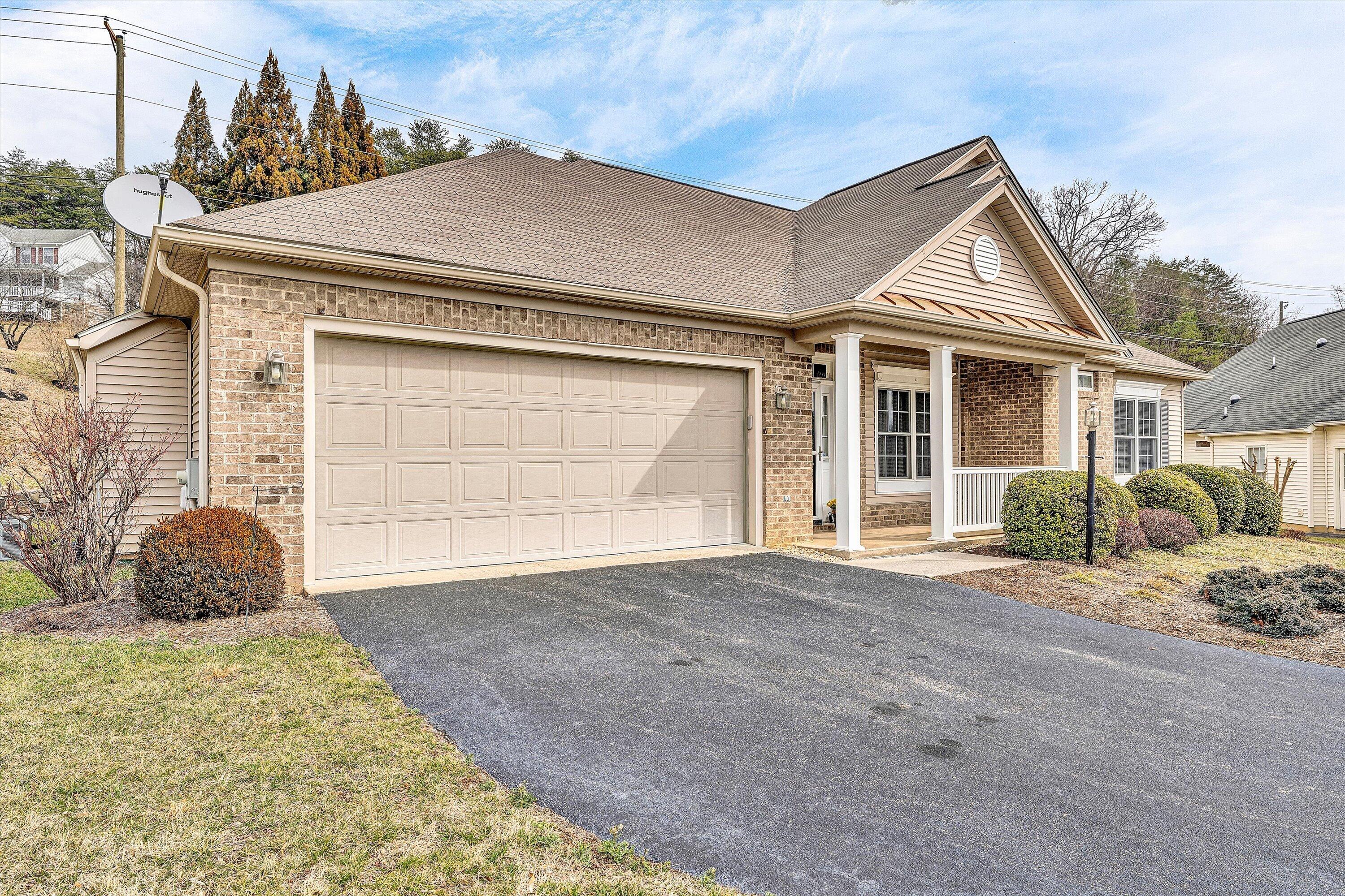 1365 Aarons Run Circle Salem, VA 24153 - Photo 3 of 35 a front view of a house with a garage
