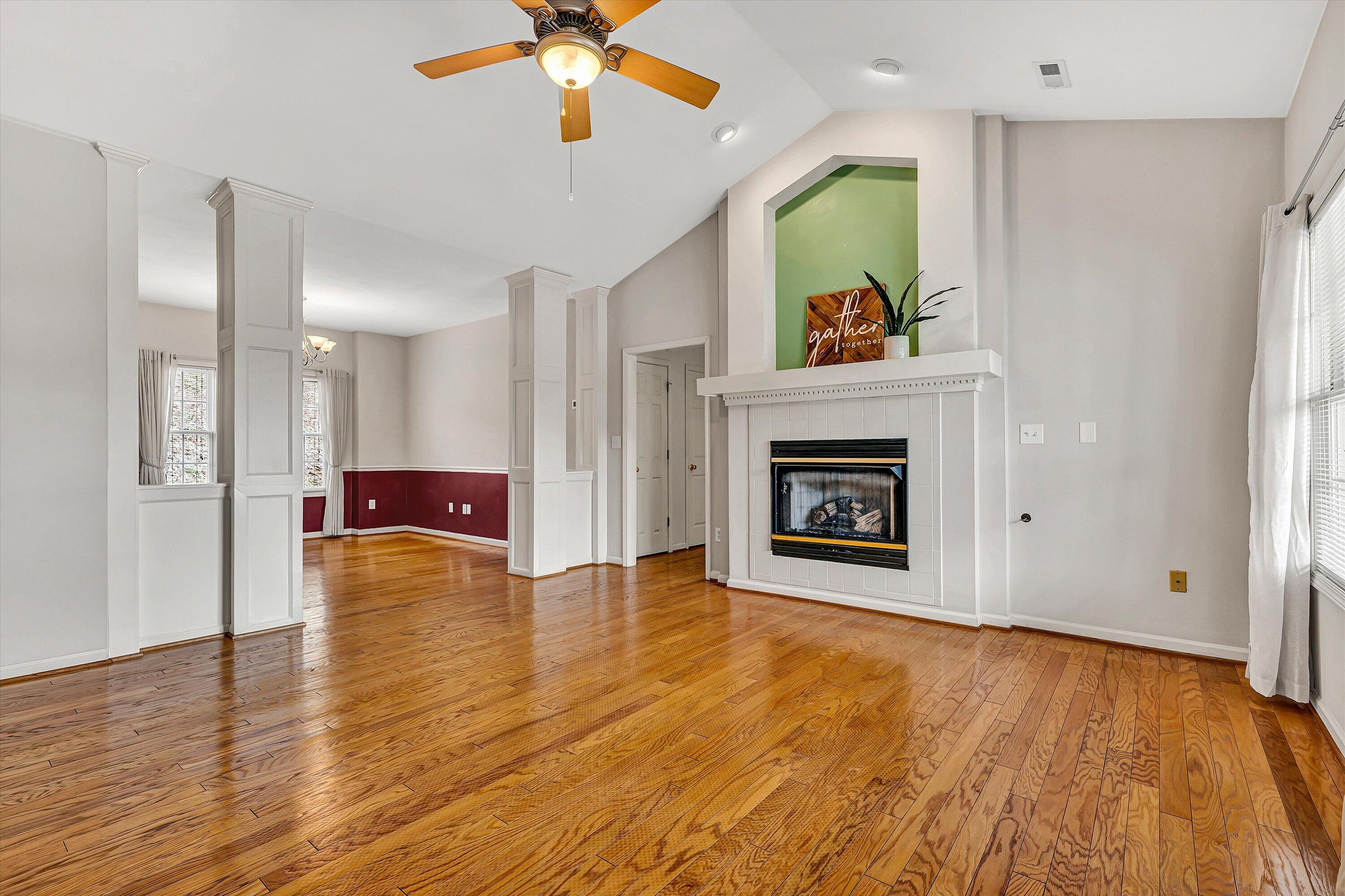 1365 Aarons Run Circle Salem, VA 24153 - Photo 7 of 35 a view of an empty room with a fireplace and a window