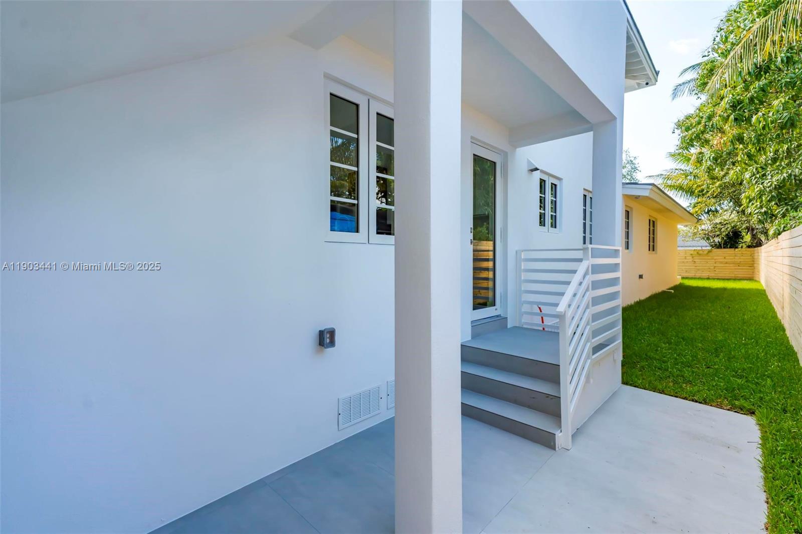 524 Northeast 65th Street, Unit 1 Miami, FL 33138 - Photo 17 of 26 a view of entryway and hall with wooden floor