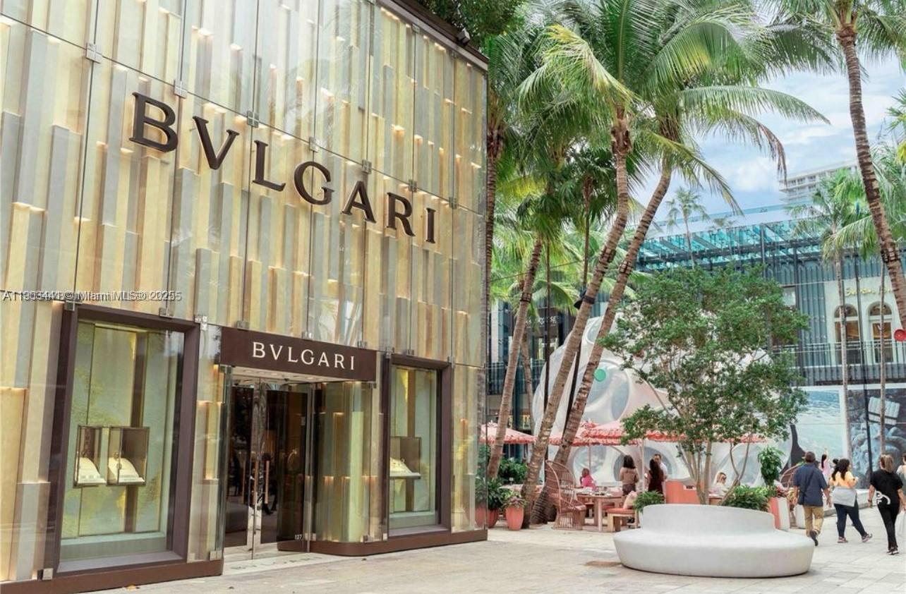 524 Northeast 65th Street, Unit 1 Miami, FL 33138 - Photo 18 of 26 a view of a building with a tree in front