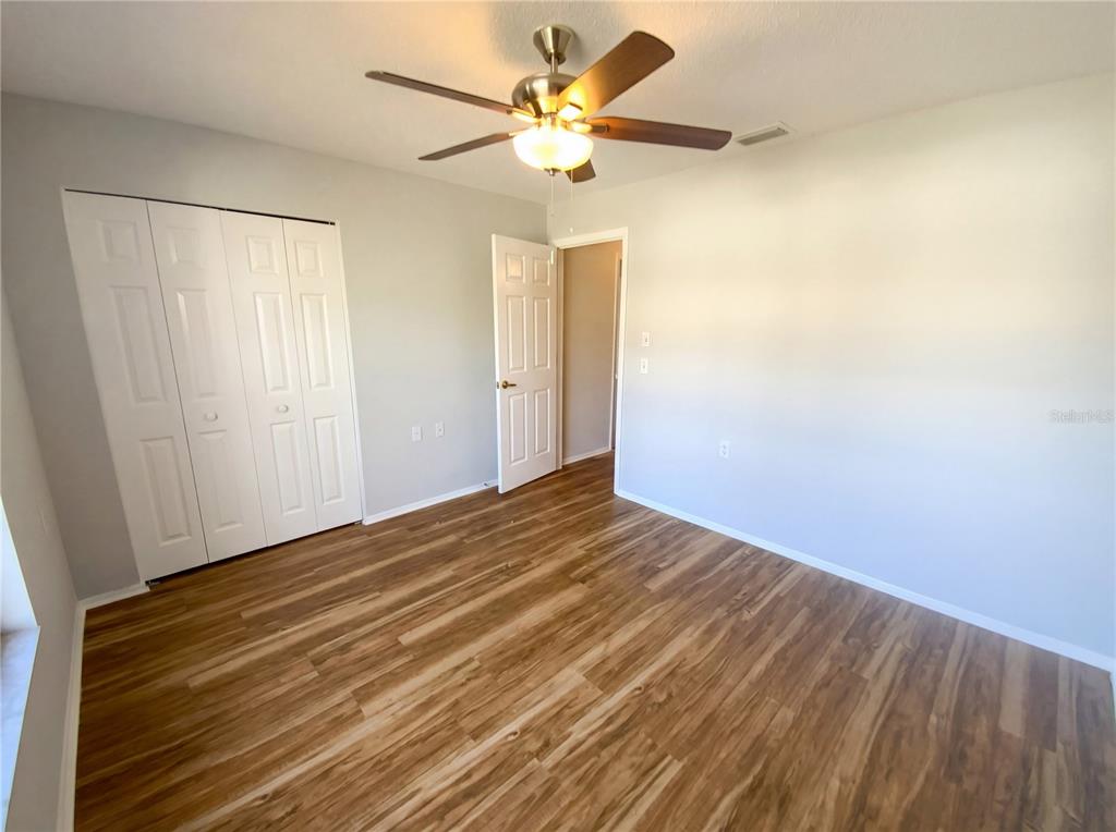 7410 Willowbrook Drive Spring Hill, FL 34606 - Photo 11 of 23 a view of an empty room with a window