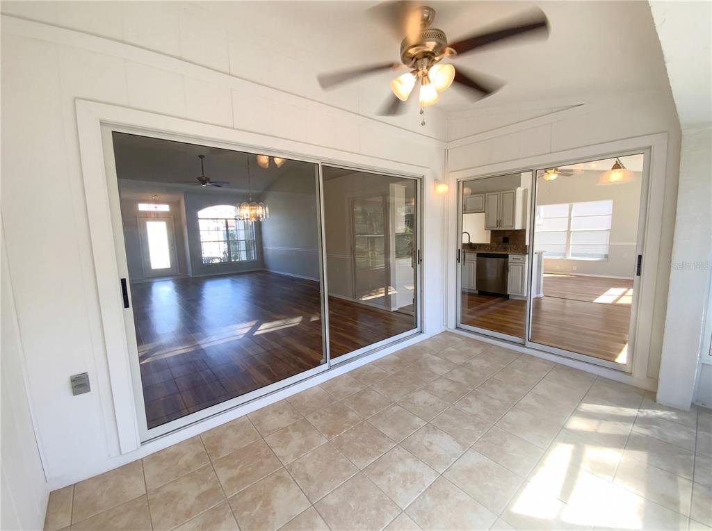 7410 Willowbrook Drive Spring Hill, FL 34606 - Photo 21 of 23 a view of livingroom with a flat screen tv