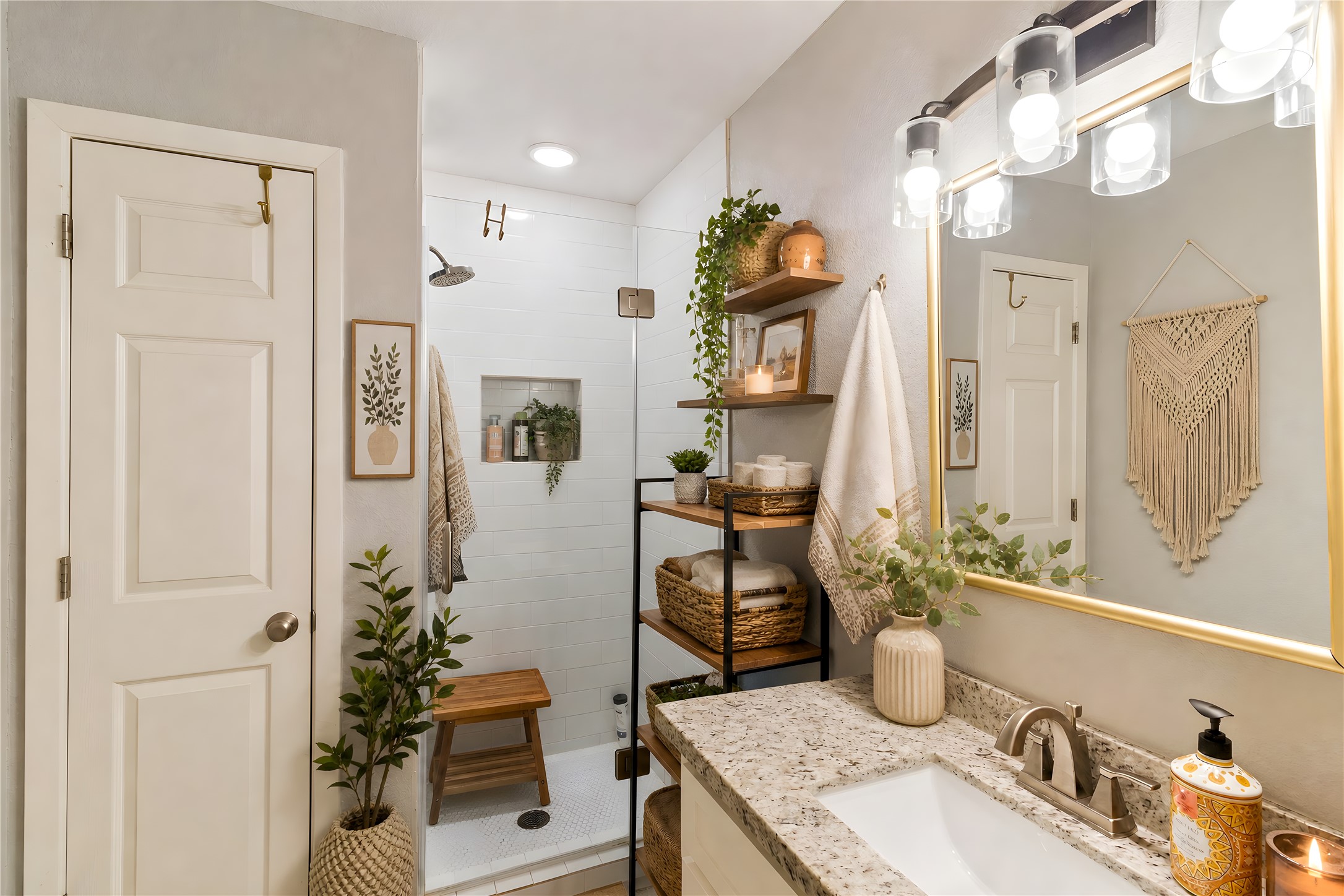 117 Cannon Street Clute, TX 77531 - Photo 15 of 24 Remodeled primary bathroom with a walk-in shower, updated vanity, framed mirror and bright lighting.