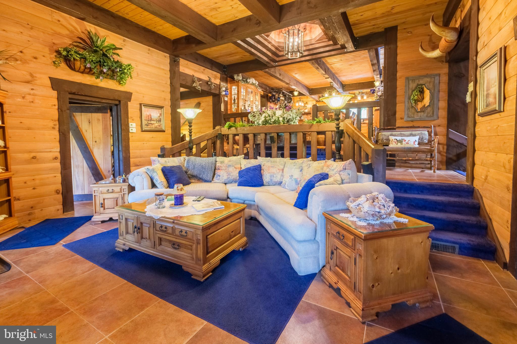 1595 Indian Springs Road Frenchville, PA 16836 - Photo 11 of 86 a living room with furniture and a table