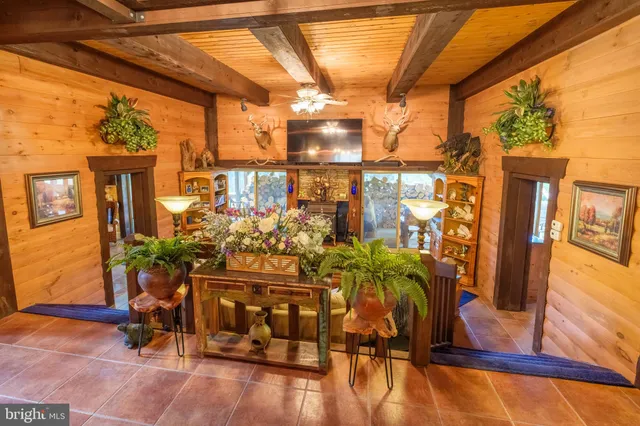 a view of a chairs and table in the patio