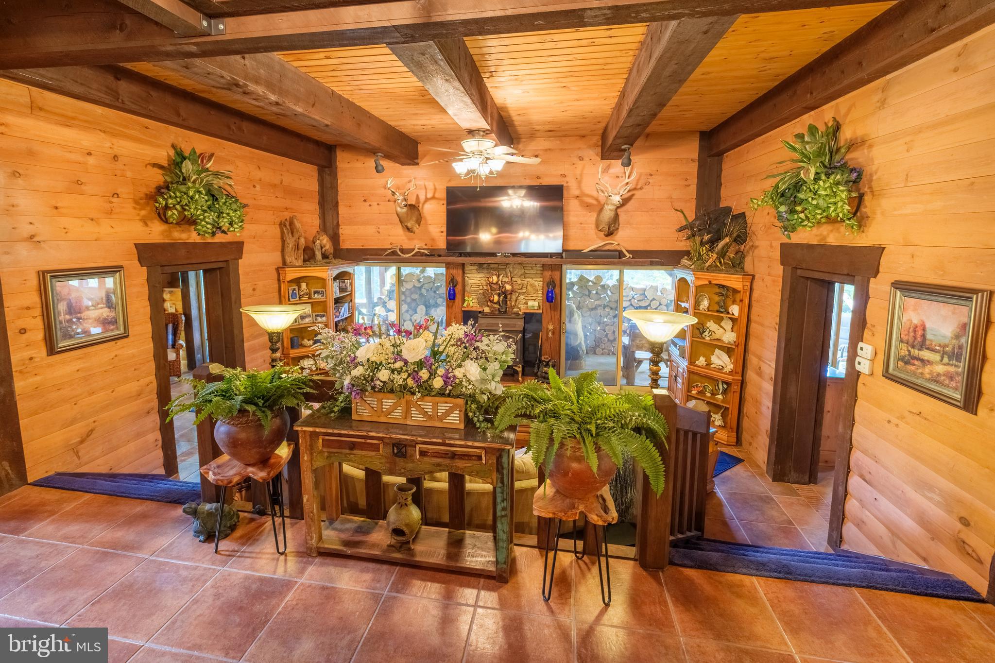1595 Indian Springs Road Frenchville, PA 16836 - Photo 12 of 86 a view of a porch with a table and chairs