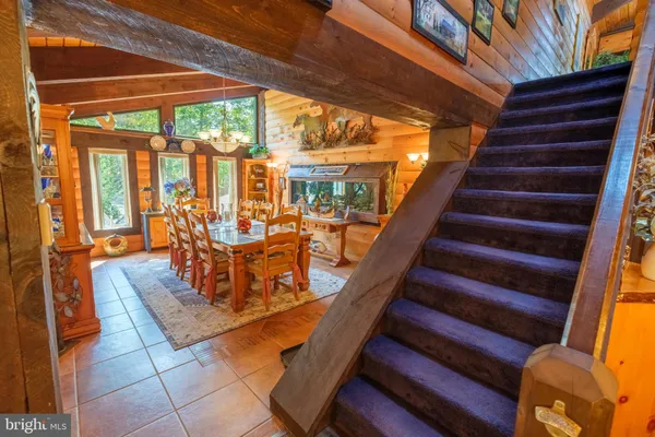 a view of balcony with wooden floor and outdoor seating
