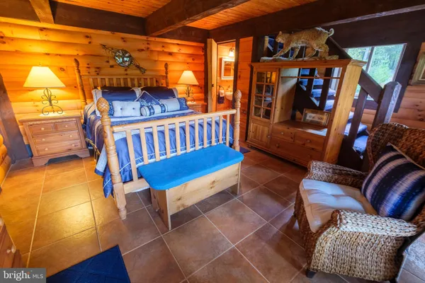 an aerial view of a residential houses with outdoor space