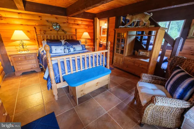 an aerial view of a residential houses with outdoor space