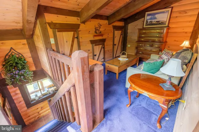 a room with furniture and wooden floor