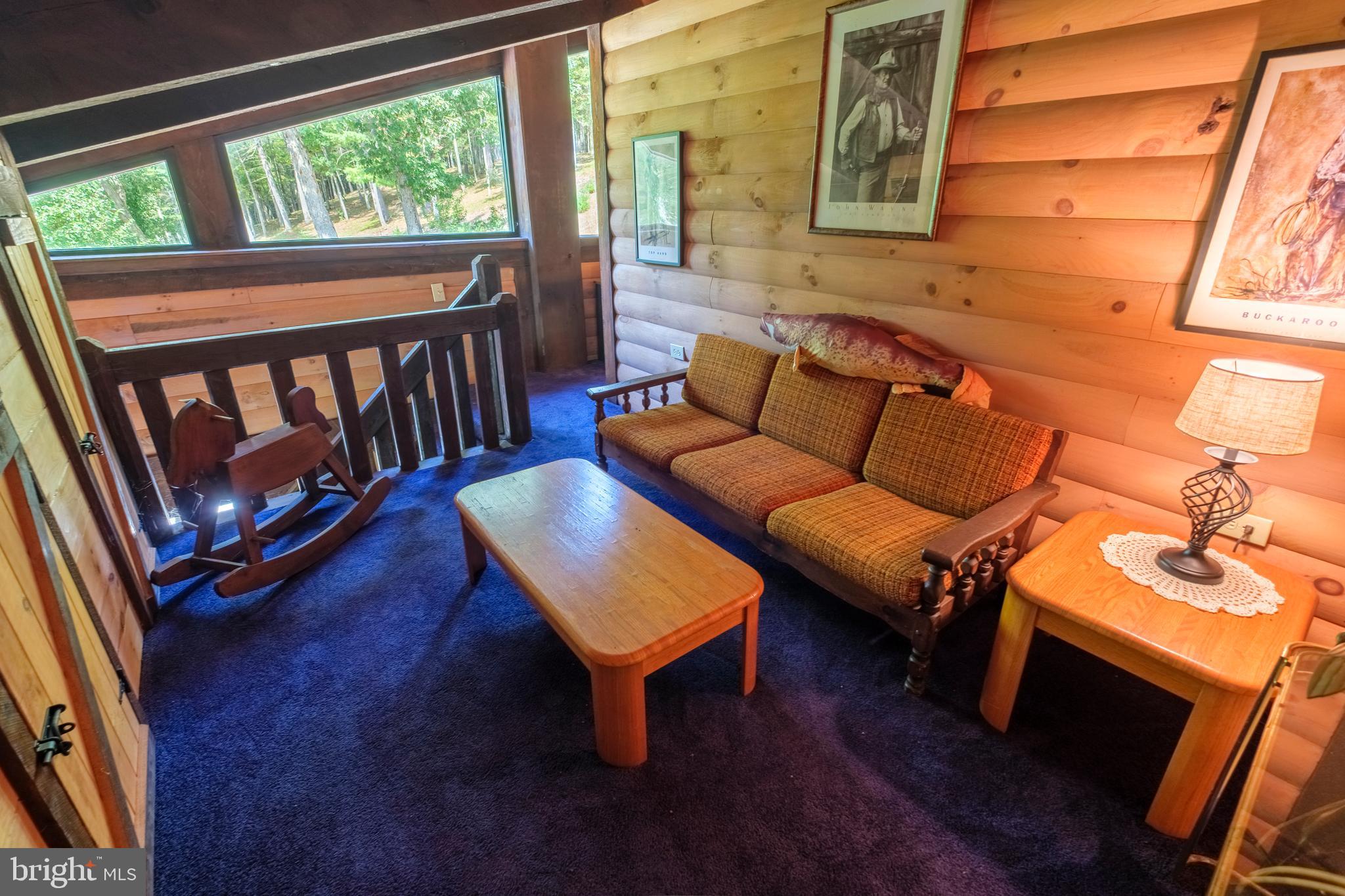 1595 Indian Springs Road Frenchville, PA 16836 - Photo 62 of 86 a living room with furniture and a wooden floor