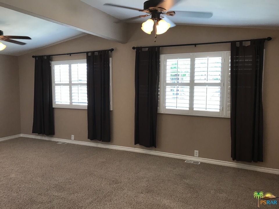 152 Capri Street Rancho Mirage, CA 92270 - Photo 7 of 21 Living Room