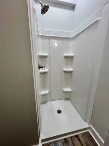 a bathroom with a toilet and a sink