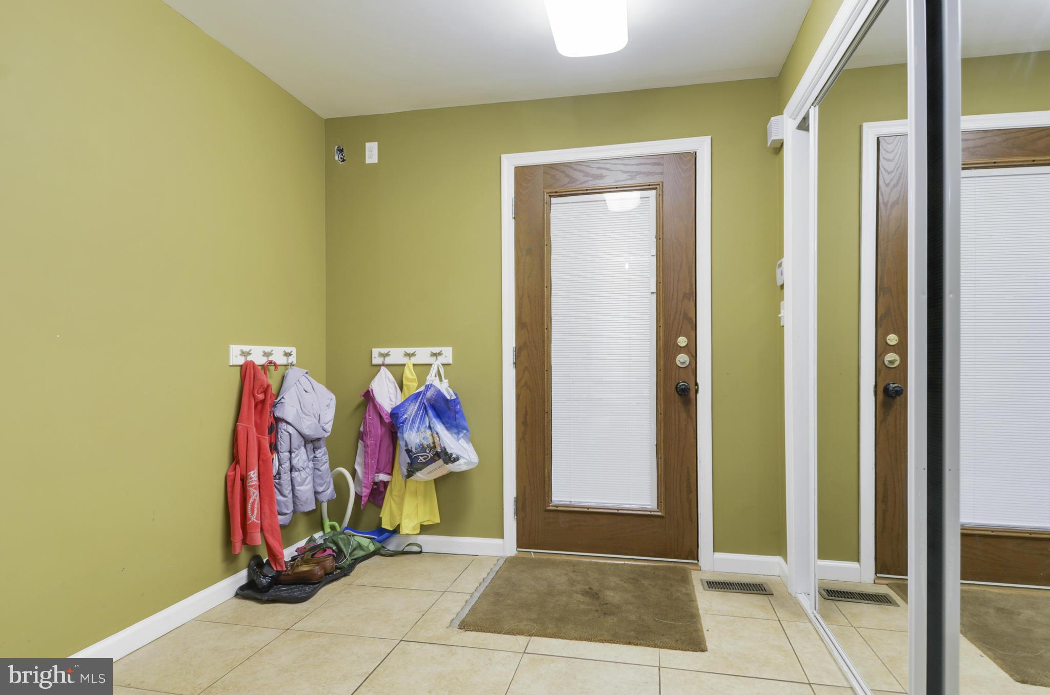 11708 Kemp Mill Road Silver Spring, MD 20902 - Photo 25 of 28 Side entry Foyer