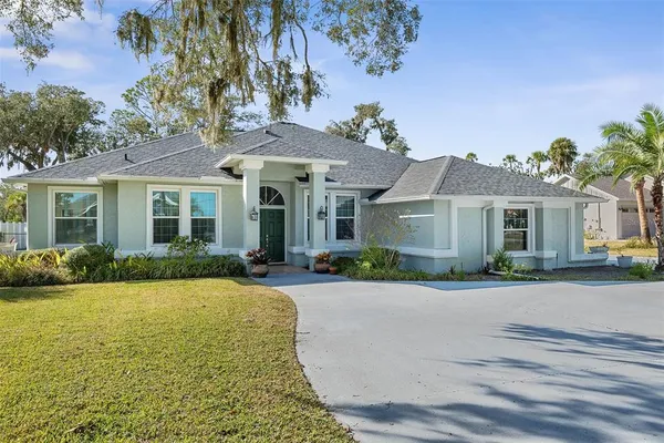 front view of a house with a yard