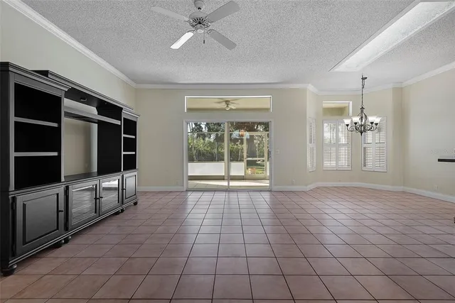 a view of a kitchen with a sink dishwasher a refrigerator and cabinets