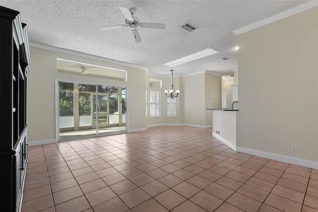 a kitchen with stainless steel appliances granite countertop a sink and a stove