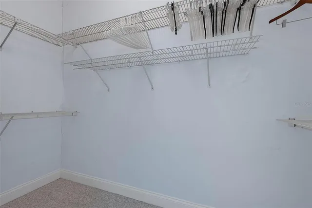 a bathroom with a sink double vanity and a mirror